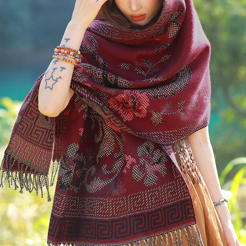Dark cyan Tibetan paisley ethnic shawl variant with vine motif detail representing interconnectedness in Buddhist philosophy