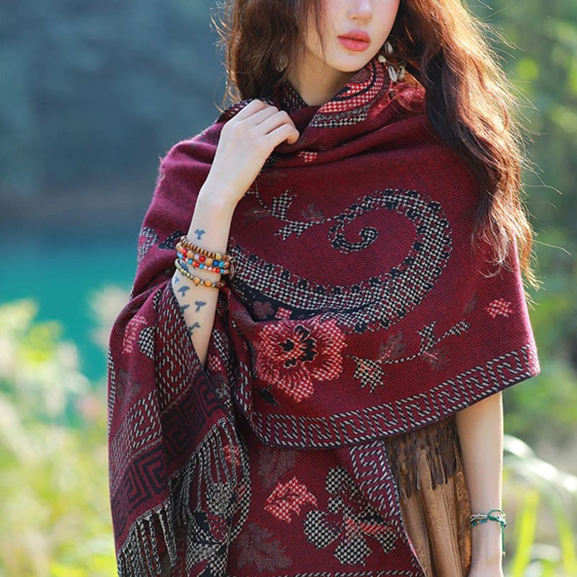 Dark red Tibetan floral paisley shawl with green accents representing traditional Himalayan color harmony and spiritual symbolism