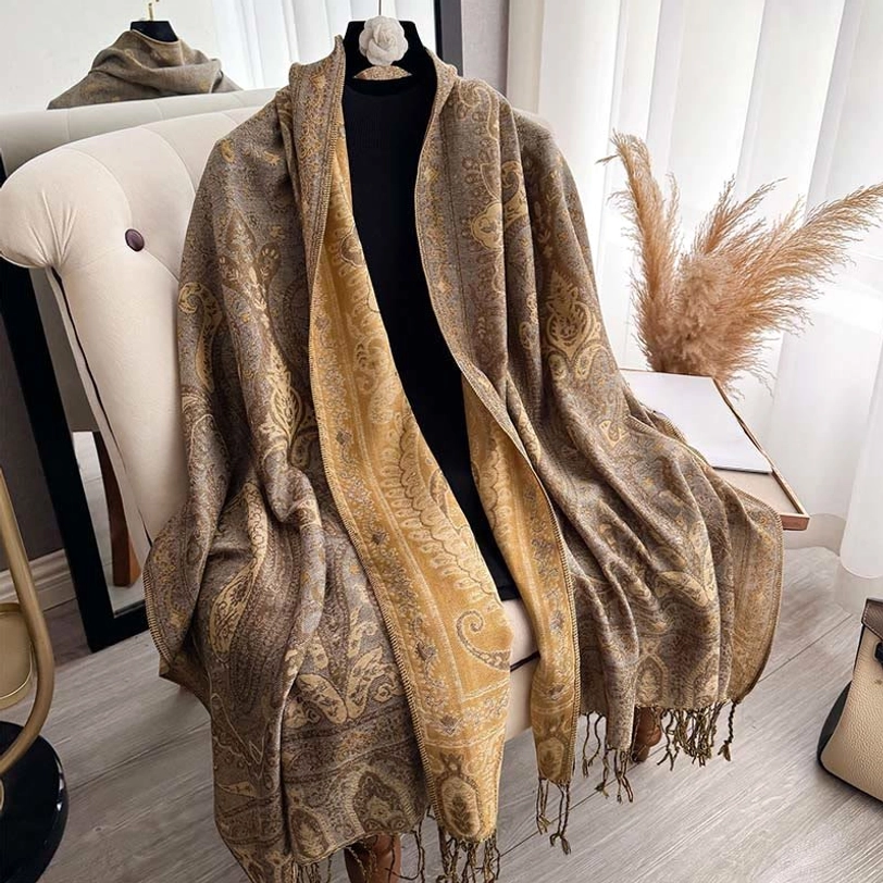 Tibetan paisley shawl draped elegantly showing movement and fabric texture