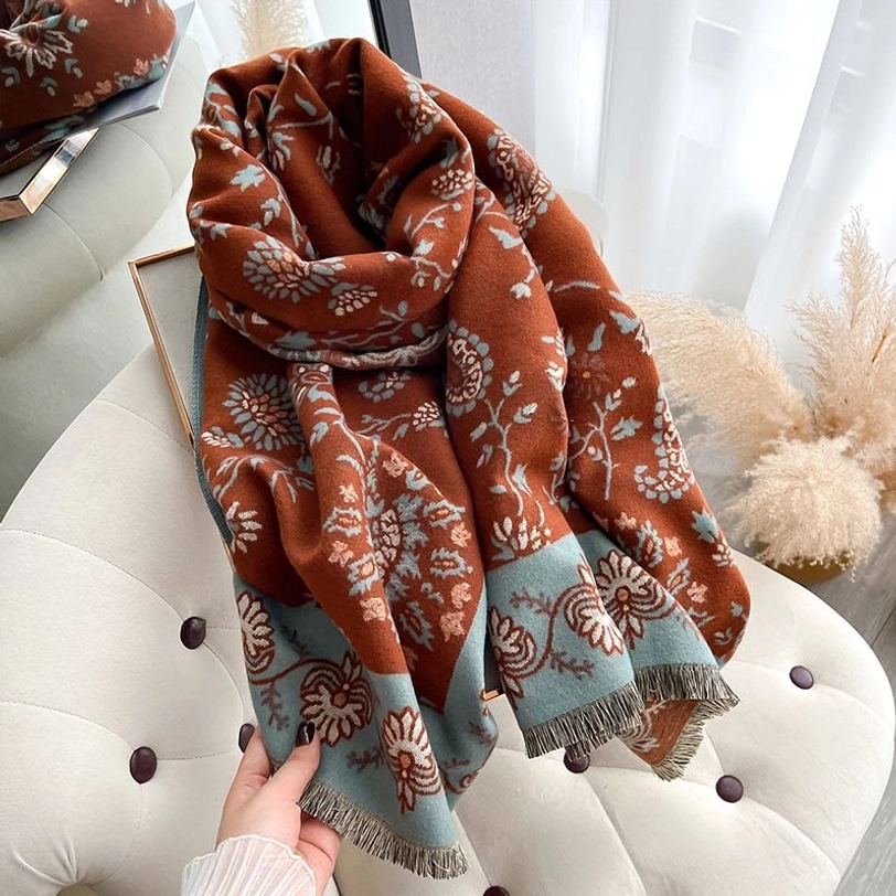 Tibetan paisley shawl folded close-up revealing woven texture and artisanal craftsmanship