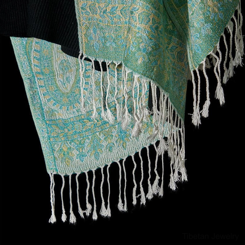 Tibetan geometric paisley tassel wrap flatlay, showing full dimensions and intricate pattern design