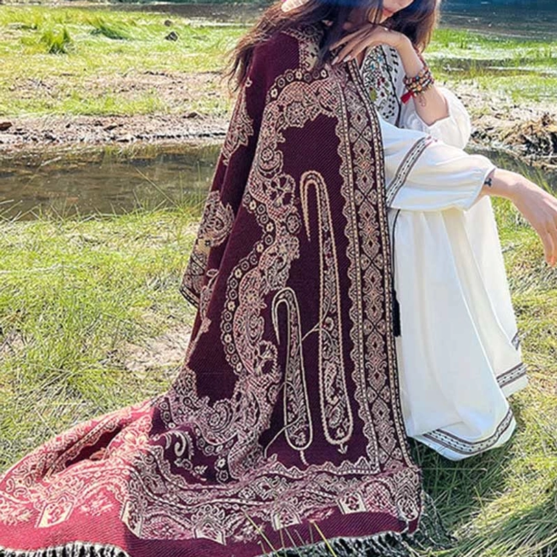 Tibetan ethnic paisley shawl with floral botanical motifs representing spiritual symbolism and cultural heritage