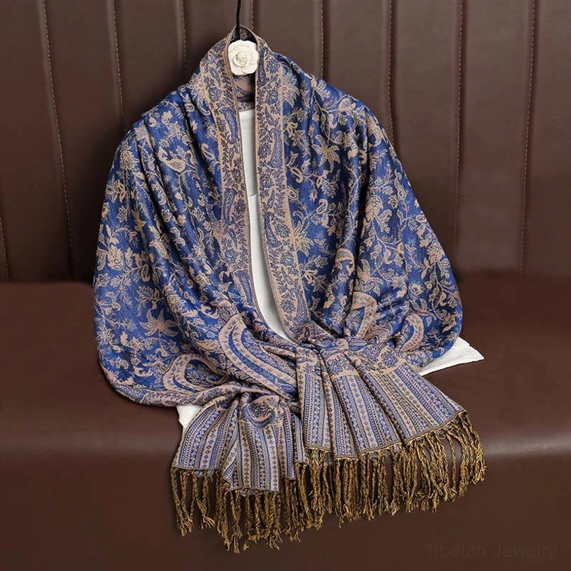 Tibetan ethnic paisley shawl folded display showing color depth and jacquard weaving quality