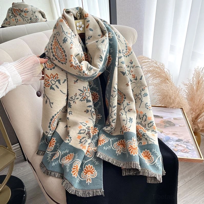 Tibetan paisley shawl with visible hand-fringed edges and artisanal weaving details