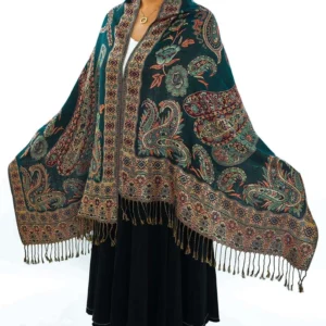 Tibetan paisley bohemian shawl front view on model dark teal with reddish-beige paisley patterns and tassel fringe