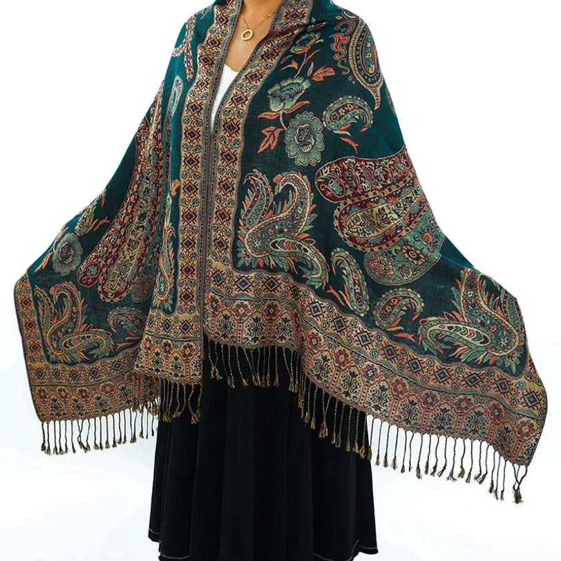 Tibetan paisley bohemian shawl front view on model dark teal with reddish-beige paisley patterns and tassel fringe