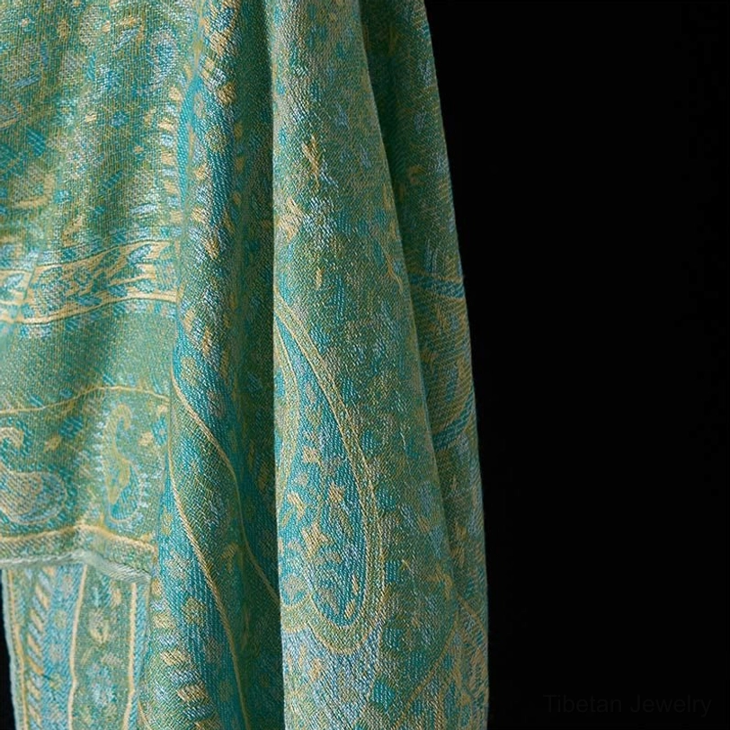 Tibetan handcrafted paisley shawl artisan detail, showcasing traditional Himalayan weaving technique