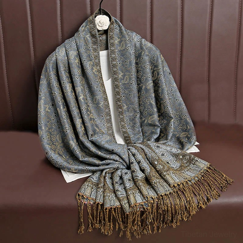 Tibetan paisley tassel shawl color variant showing how each handcrafted piece features unique natural color variations from traditional dyeing