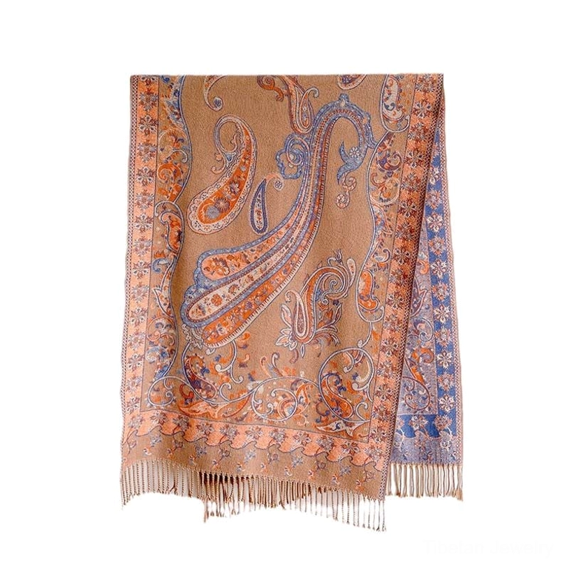 Tibetan handcrafted paisley tassel shawl showcasing authentic artisanal weaving and cultural heritage