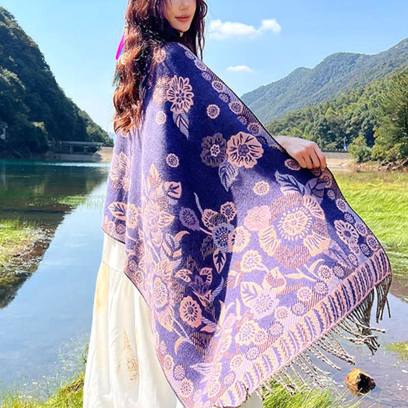 Tibetan jacquard paisley shawl worn as head wrap showcasing traditional styling and protective thermal properties