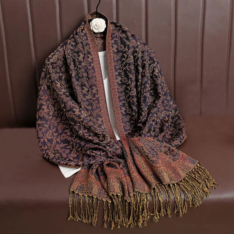 Tibetan paisley shawl in deep indigo blue tone showing rich color saturation and quality of natural dye process used in artisan creation