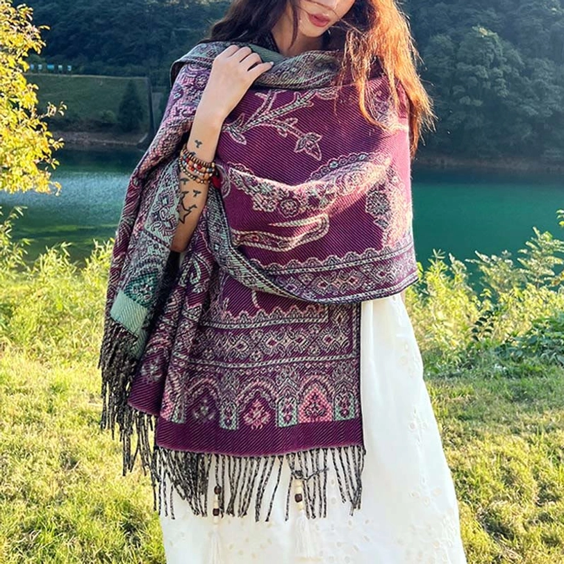 Tibetan ethnic paisley shawl in jewel tone showing rich color depth and thermal comfort for layering with modern wardrobe