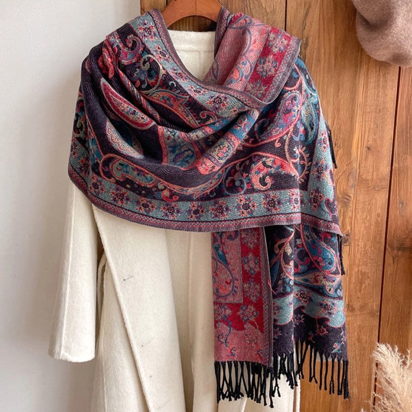 Khaki Tibetan tassel shawl detail close-up showing fine weave quality and paisley pattern in warm neutral tones