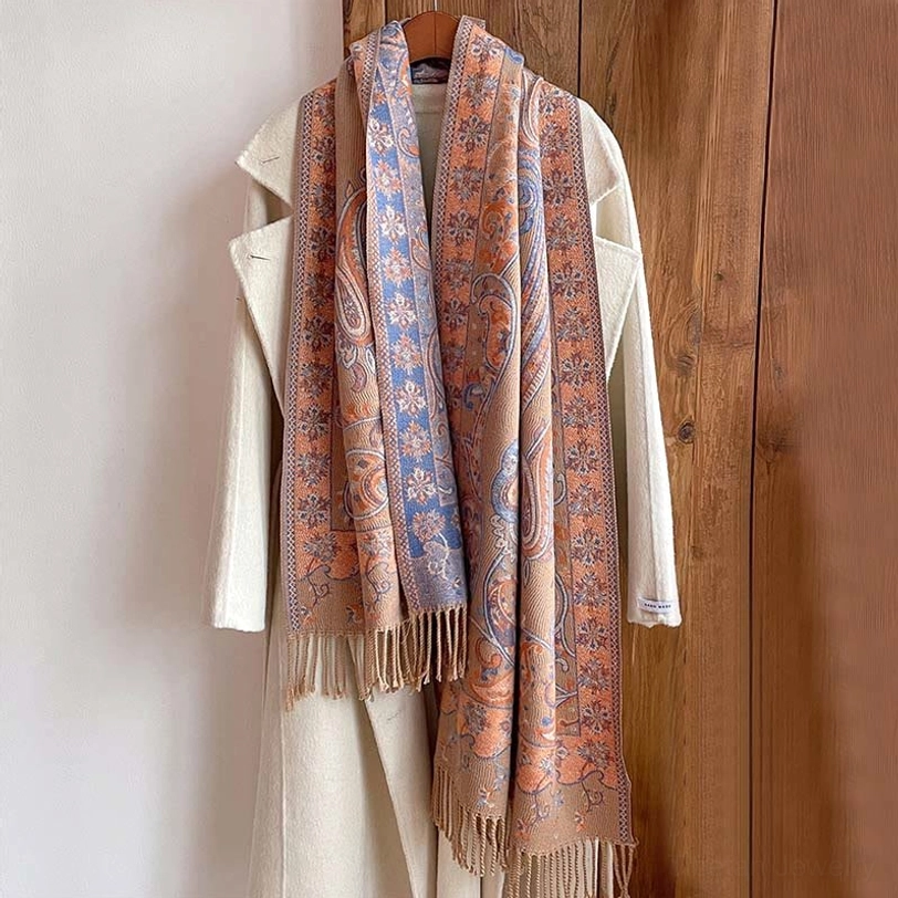 Tibetan handwoven paisley shawl with natural linen color and decorative tassel trim