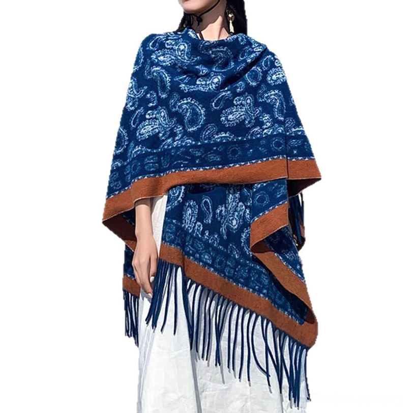 Tibetan navy paisley printed shawl with brown trim and tassel fringe, front side view at salt lake outdoor backdrop showing full fabric drape