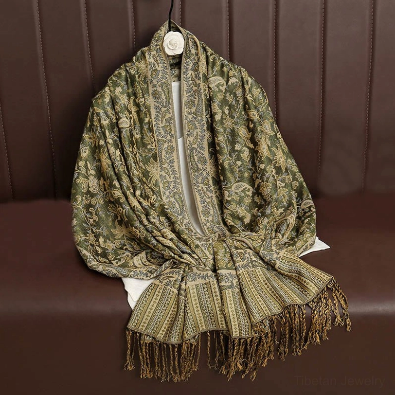 Tibetan paisley shawl showing jacquard pattern symmetry and authentic ethnic weaving craftsmanship