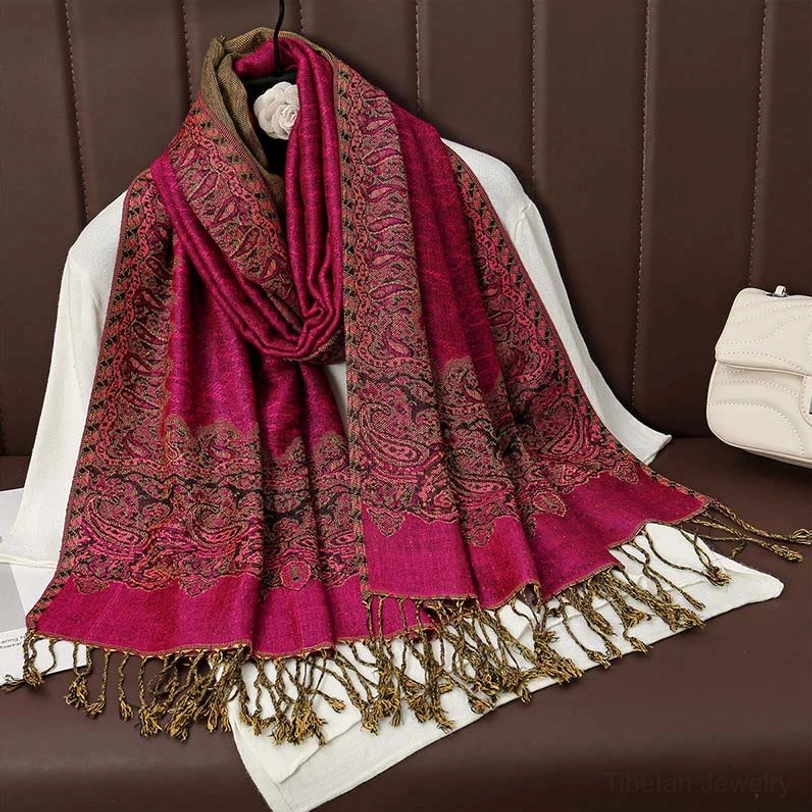 Rose red and warm brown rich paisley tassel shawl showing intricate paisley patterns and coordinated tassel fringe