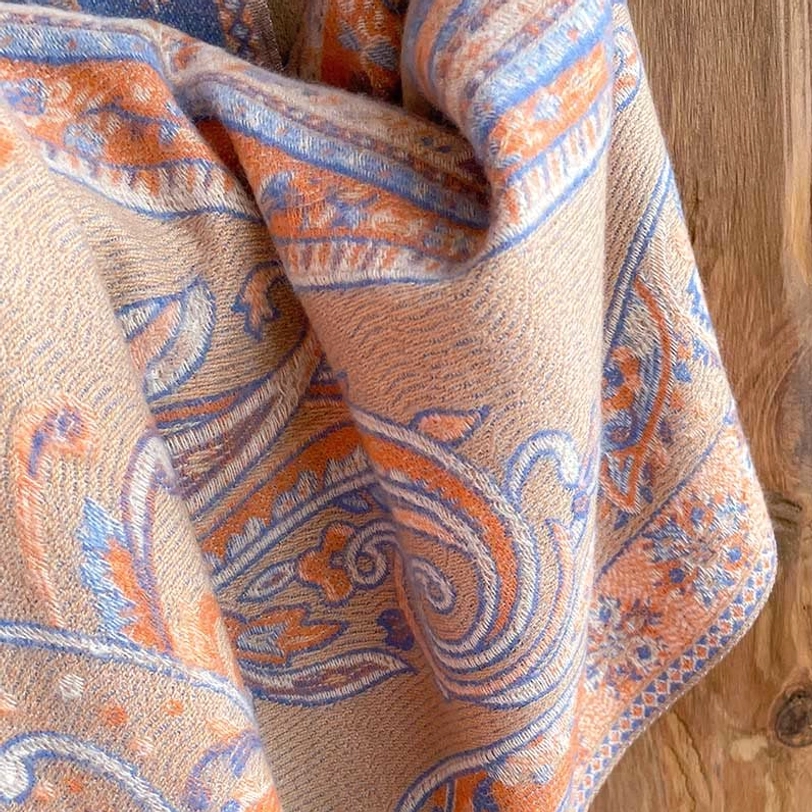 Tibetan paisley tassel shawl versatility shot displaying multiple wearing and draping styles