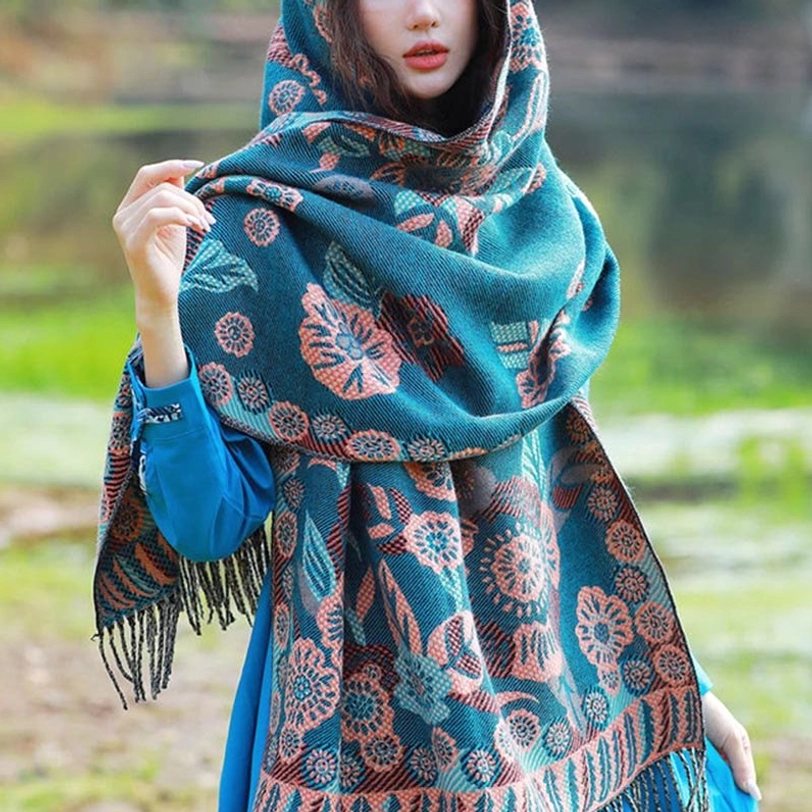 Tibetan paisley shawl detail showcasing tassel fringe craftsmanship and fine material quality of acrylic-rayon blend