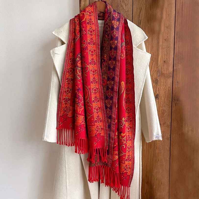 Tibetan paisley tassel shawl detail shot highlighting authentic handcrafted tassel fringe and fabric quality