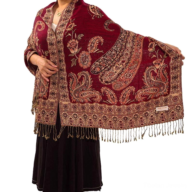 Tibetan paisley bohemian shawl lifestyle flat lay showing texture and pattern composition