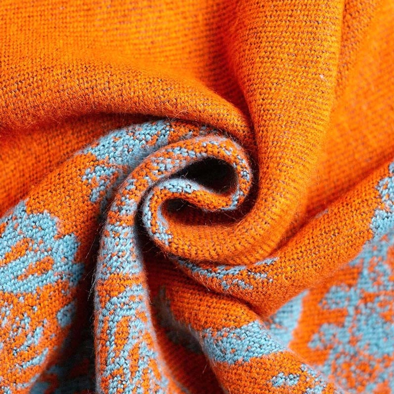 Tibetan thermal shawl macro texture close-up orange teal paisley jacquard weave