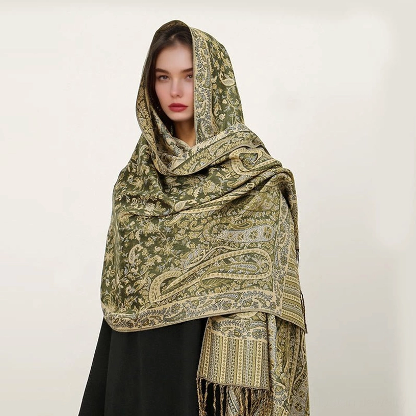 Tibetan ethnic paisley shawl styled over casual clothing showing everyday versatility and bohemian appeal