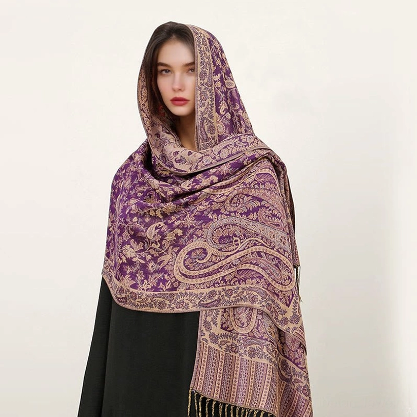 Dark magenta Tibetan paisley shawl with golden jacquard patterns and decorative tassel hem