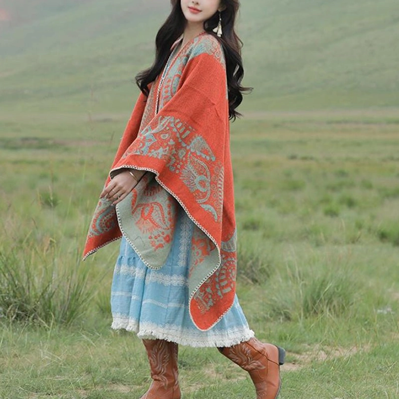 Tibetan paisley wrap styled as elegant evening shawl at formal occasion or upscale event
