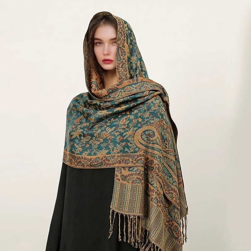 Teal Tibetan ethnic paisley shawl with handcrafted jacquard patterns and traditional tassel hem