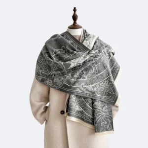 Tibetan pavilion koi fish scarf shawl with black and off-white traditional motifs displayed on mannequin front three-quarter view