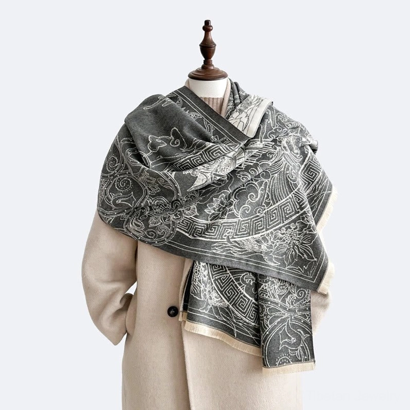 Tibetan pavilion koi fish scarf shawl with black and off-white traditional motifs displayed on mannequin front three-quarter view