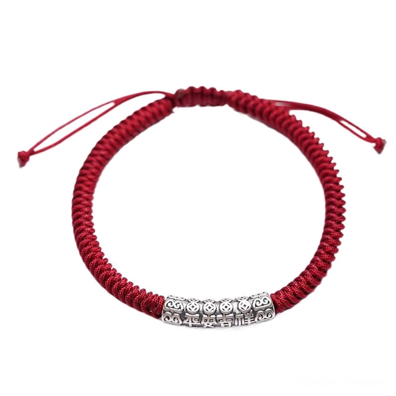Tibetan peace and good fortune rope bracelet with sterling silver engraved charm, traditional Buddhist protection cord