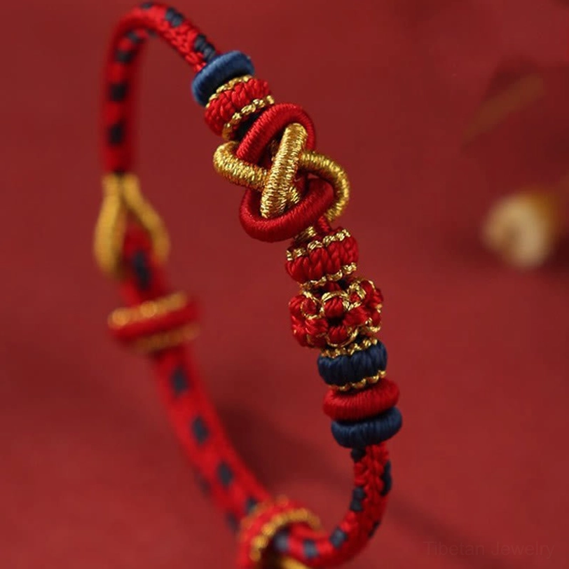 Close-up detail of handwoven peace knot bracelet showing twisted central knot design and color variations