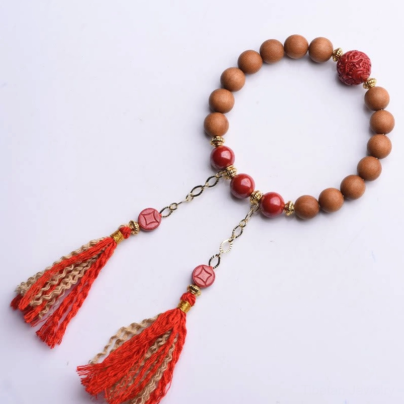 Tibetan peach wood pixiu cinnabar wealth bracelet collection showing multiple style variations and bead arrangements