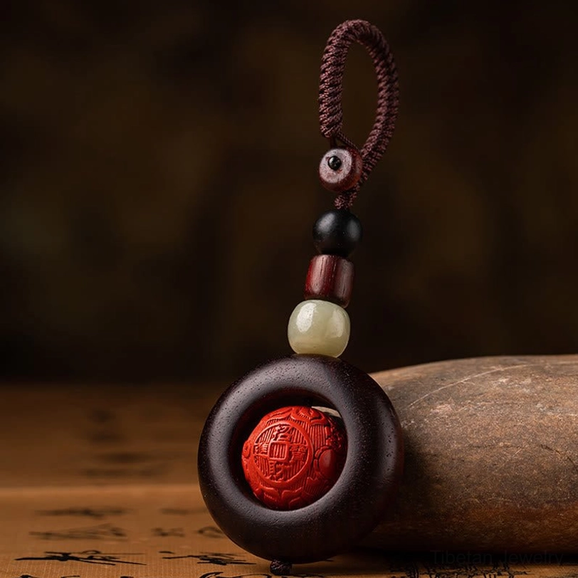 Tibetan Pi Xiu protection keychain showcasing celestial guardian and prosperity symbolism
