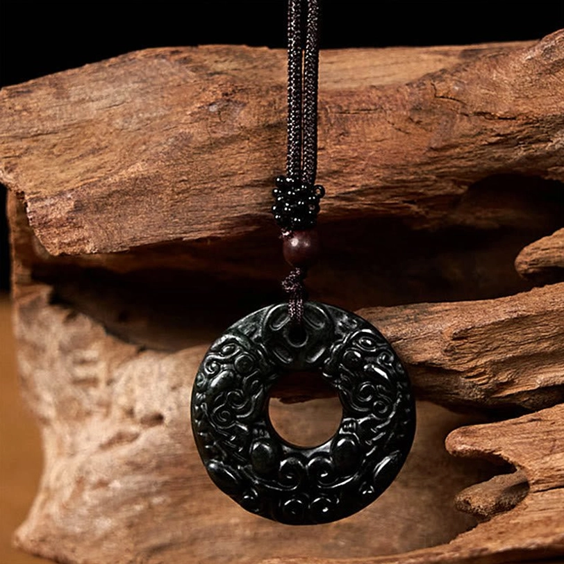 Detailed Pixiu relief carvings on Nanyang black-green jade peace buckle pendant necklace