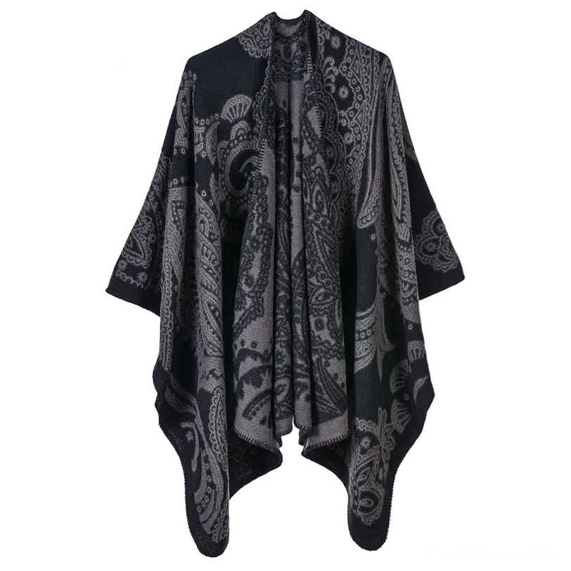 Tibetan poncho shawl in dark gray, flat lay front view highlighting paisley motif and oversized fit