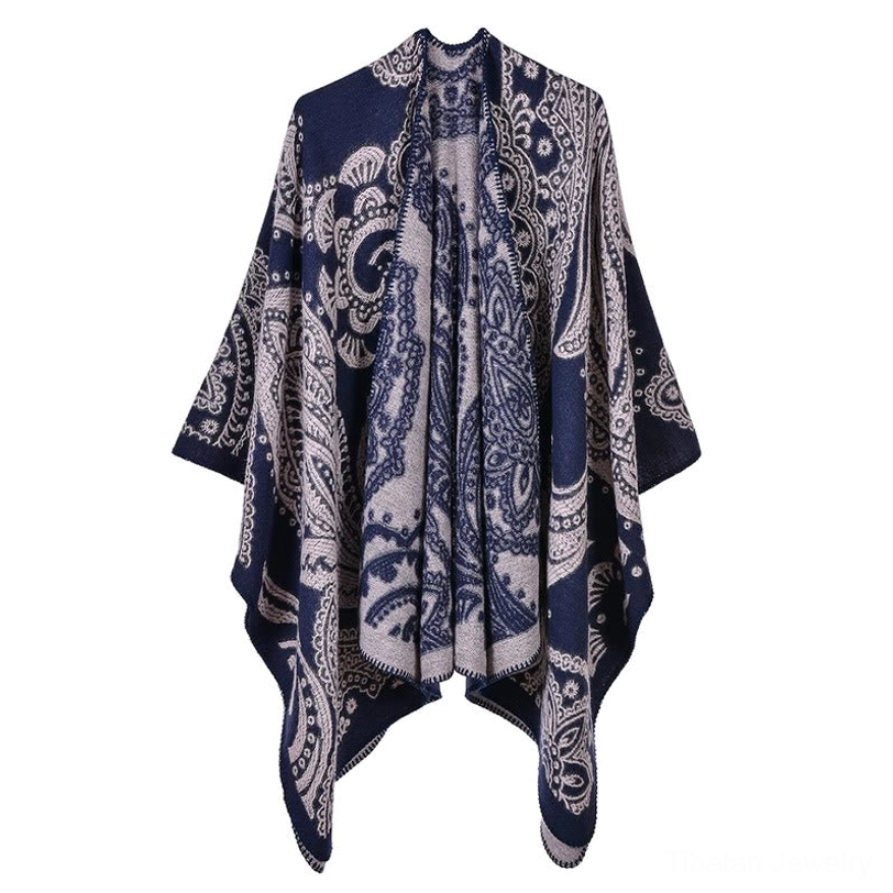 Tibetan poncho wrap flat lay, navy light gray paisley print, oversized draped silhouette