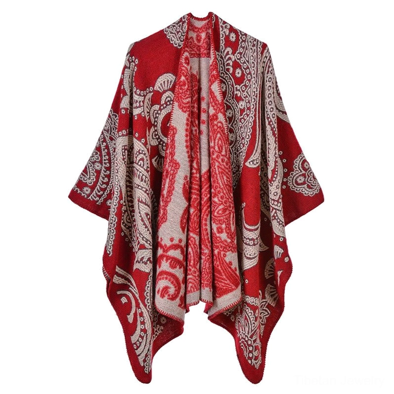 Tibetan paisley poncho shawl flat lay, red and taupe paisley pattern showing contrasting color scheme