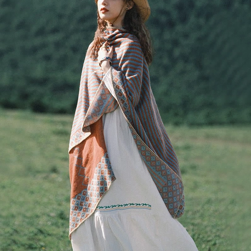 Tibetan striped poncho layered over winter clothing demonstrating versatile styling options and comfortable fit