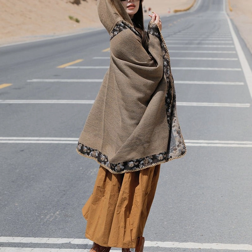 Tibetan hooded poncho oversized fit detail showing relaxed silhouette and comfortable draping