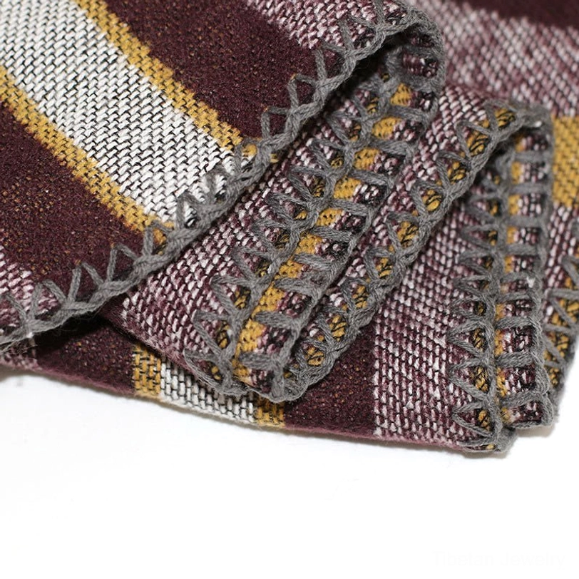 Tibetan striped poncho shawl lifestyle photography showcasing everyday styling versatility