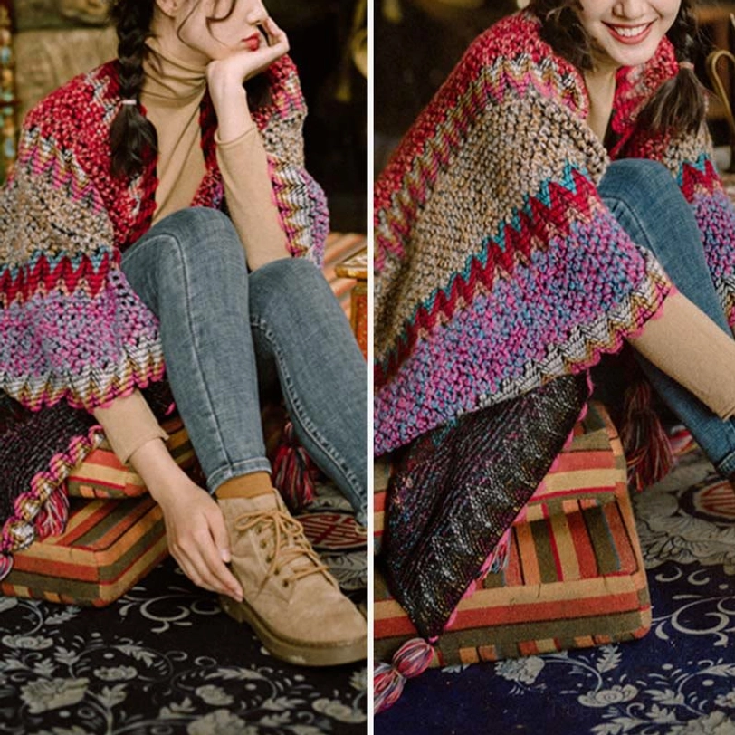 Tibetan ethnic poncho shawl detail shot showing tassel trim craftsmanship and handwoven textile quality