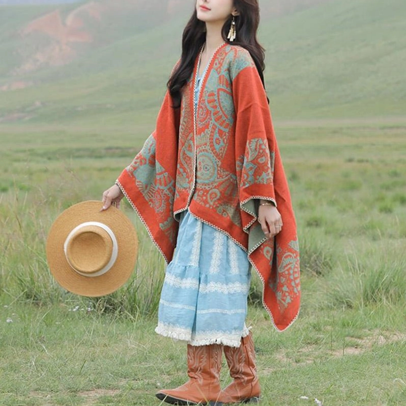 Tibetan poncho shawl draped as cozy home blanket throw on sofa for winter comfort