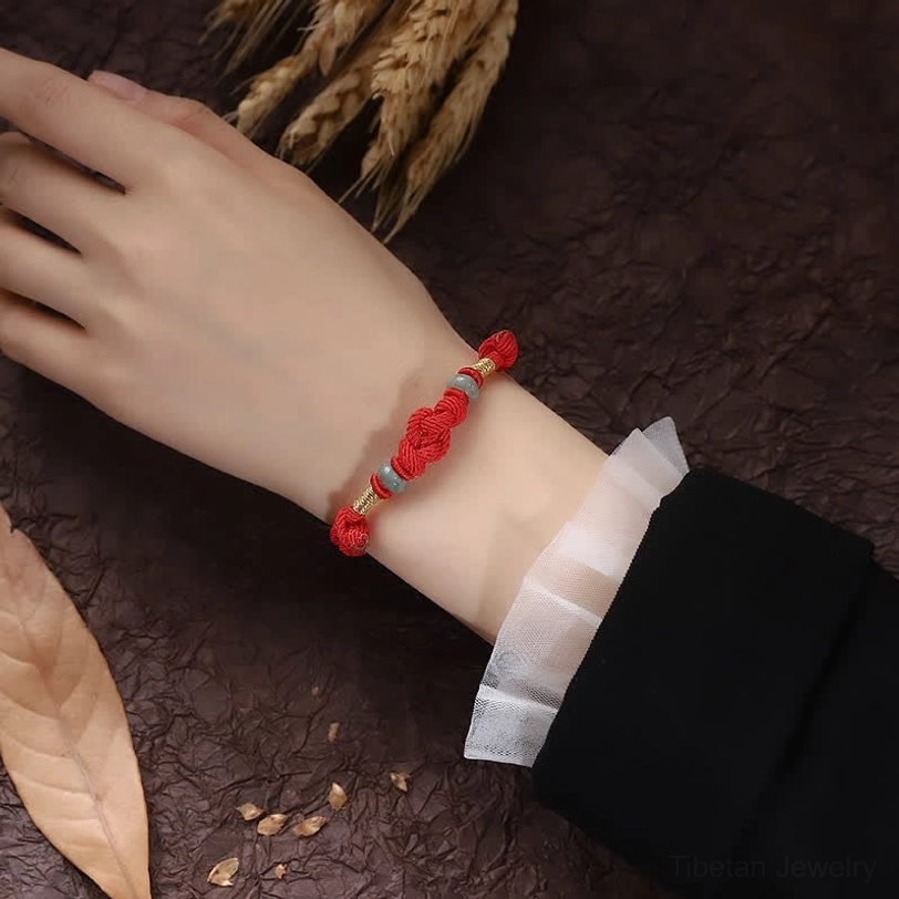 Red string jade prayer bracelet with spiritual blessing card perfect for meditation and mindfulness practice