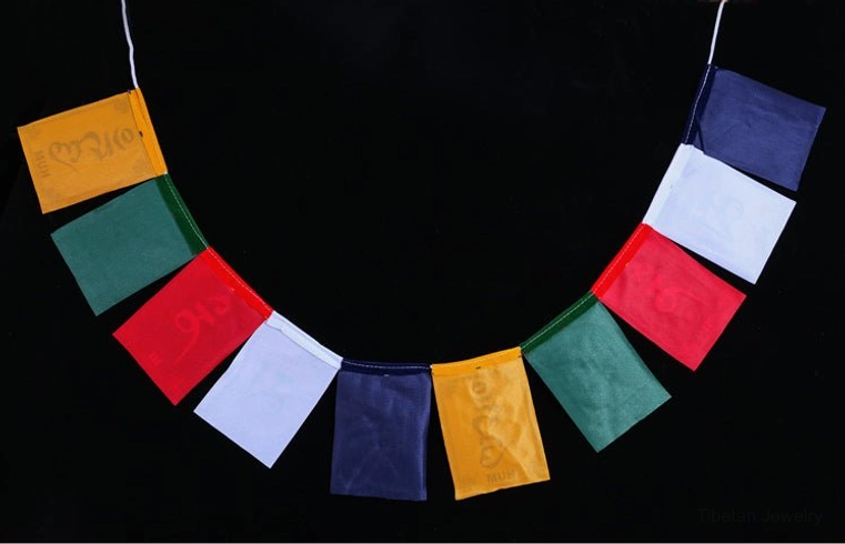 Tibetan prayer flags spreading blessings and positive energy through wind circulation Buddhist practice