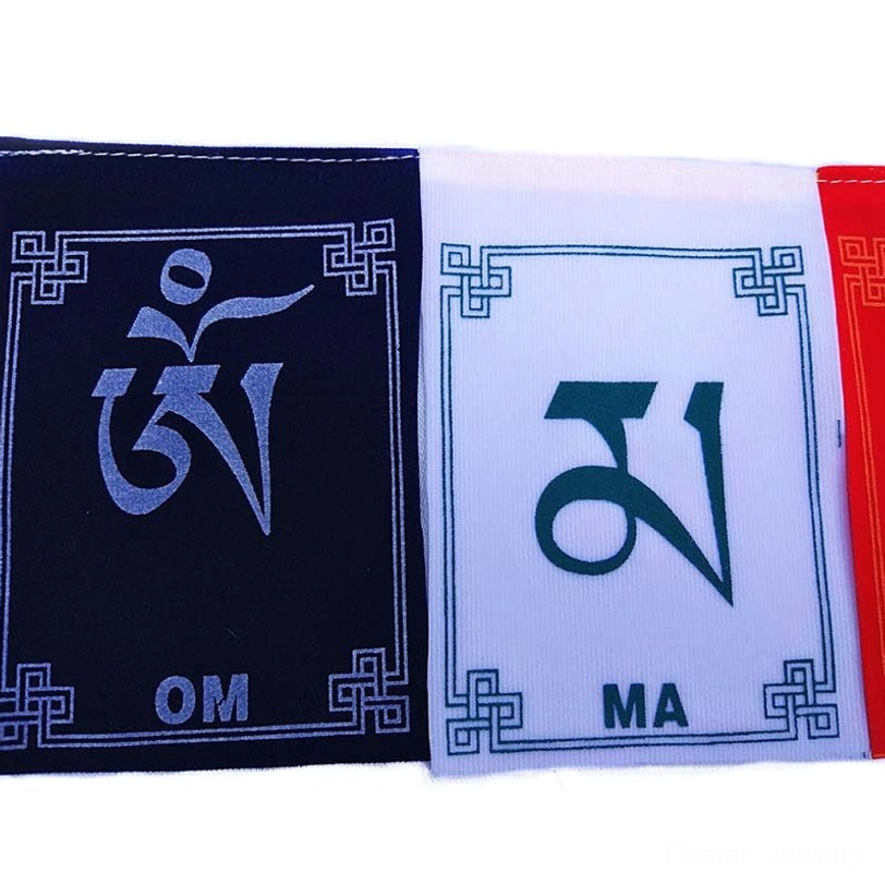 Tibetan windhorse prayer flag installed as car decoration creating positive spiritual energy while traveling