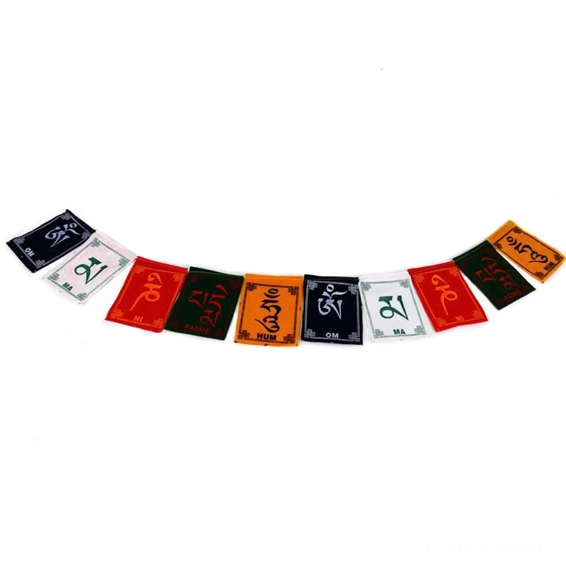 Curved arrangement of Tibetan windhorse prayer flag strands with mixed-color mantra flags on white background