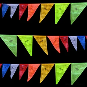 Strung Tibetan prayer flag garland with rainbow five-element colors and printed Tibetan scriptures